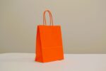 Papierová taška oranžová PLUS krútené ucho 180x80x220 mm